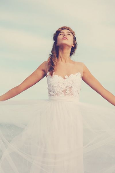 Magical white lace wedding dress with soft tulle skirt and invisible neck line