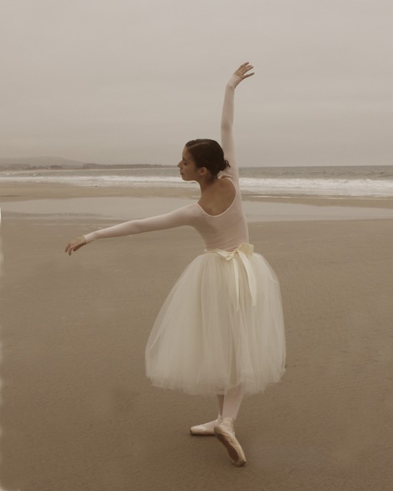 dancing ballerina on the beach
