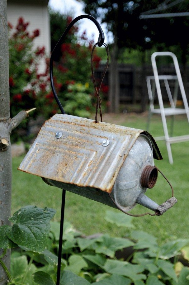 watering can birdhouse