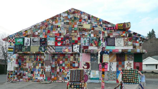 knit graffiti all over a house